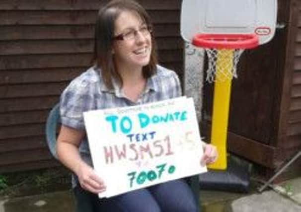 Hayley Welsh awiats the 'ice bucket challenge in aid of the Autism NI charity. INCT 37-650-CON