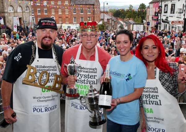 Press Eye - Belfast - Northern Ireland -  6th September 2014 - Picture by Darren Kidd / Press Eye.

 Hillsborough Oyster Festival: Bob Shoudt, Colin Shirlow  and Miki Sudo with Kerry Boyd - Autism NI

COLIN MAKES IT TEN IN A ROW
Dromore man Colin Shirlow has made it 10 years in a row by winning the World Oyster Eating Championship at the Hillsborough International Oyster Festival today (Saturday 06 September).
Colin ate 208 oysters in 3 minutes but failed to match his World Record of 233 oysters which he set back in 2005.
Speaking after his victory Colin said  
It was a very tough competition this year with two fabulous challengers.  I am delighted to have won my tenth title and very relieved that I wont have to eat any oysters again until this time next year.
I also have no doubt that the quality of my competition this year also played a big part in me breaking my record.  Miki Sudo and Bob Shoudt were formidable challengers and I really had to focus on my technique to beat them.  
Miki Sudo (28) from La