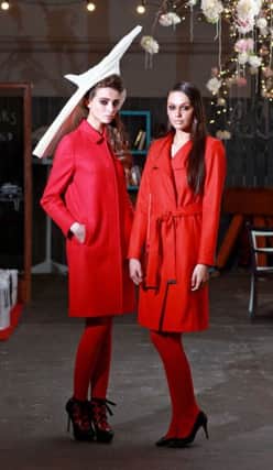 Pictured at the launch of West Coast Cooler FASHIONWEEK model Lauryn Greer wearing Jigsaw wool edie coat, £299 worn with Marie Claire Millinery tall top hat in white (POR) and model Rebekah Shirley wearing Ted Baker at Excel tangerine wrap coat, £299 worn with Grainne Maher red Perspex bag.