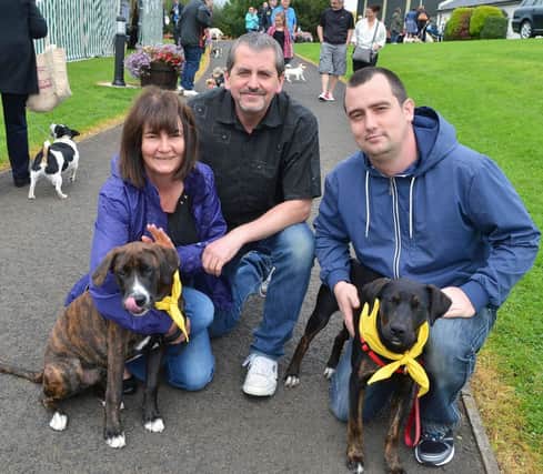 Dogs Trust Open Day supporters Julie, Robert and Mark with doggies "Hudson and Letty". INBT 37-919H
