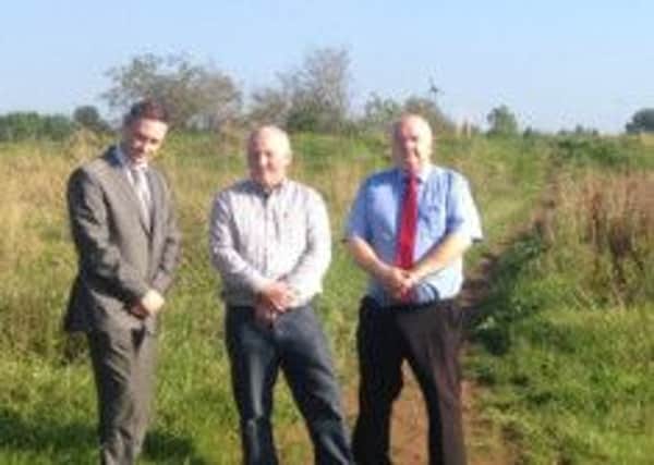 DUP MLA Paul Frew who is calling for multi-agency meeting to tackle reckless scrambler us at Ballykeel pictured with local councillors Reuben Glover and Martin Clarke.