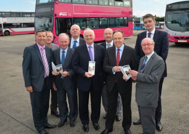 Pictured during the recent meeting at Newtownabbey bus depot are (l-r) Paul Girvan MLA, Cllr Stephen Ross, Cllr Michael Maguire, Frank Moore (Translink NI Railways Route Manager), Rev William McCrea MP, Cllr Trevor Beatty, Nigel Dodds MP, Gerry Mullan (Translink Service Delivery Manager) and Cllr Phillip Brett. INNT 38-501CON Pic by Aaron McCracken/Harrisons
