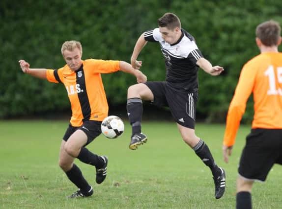 Action from Saturday's game between South Antrim and First Lisburn, at Barbour Playing Fields. US1437-521acd  Picture: Cliff Donaldson