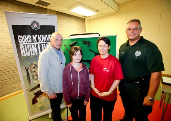 Pictured at the 'Guns n Knives Ruin Lives' workshop are (l-r) Alderman John Blair (PCSP Chair), Sophie Love, Debbie Taylor (PCSP Project Officer) and Constable Mark Hetherington. INNT 38-504CON