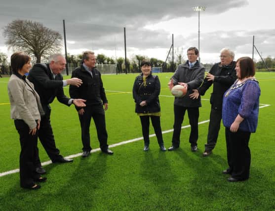 Magherafelt councillors join in the fun at the official opening of the new 3G pitch at the Meadowbank Sports Arena.