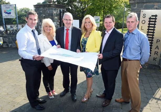 KENNEDY - BANBRIDGE GOSPEL LANE LINK ROAD IMPROVEMENT SCHEME SET TO BEGIN.

Transport Minister Danny Kennedy has announced that a £500,000 capital scheme in partnership with Banbridge District Council to provide 290 metres of new link road and footways at Gospel Lane in Banbridge is set to begin on the 2nd September 2014 with work  expected to last around 12 weeks.

Pictured are L-R James Kelly, Traffic and Network Development Manager DRD Transprt NI, Cllr Carol Black, Banbridge District Councill, Transport Minister Danny Kennedy, Jo-Anne Dodson MLA (Upper Bann), Cllr Glenn Barr, Banbridge District Council and Pearse McAvoy, McAvoy Construction (Banbridge).
Photo by Simon Graham/Harrison Photography