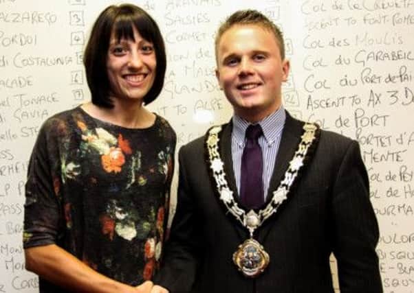 Newtownabbey mayor Thomas Hogg welcomes Amy Brice home after she completed the Haute Route Triple Crown challenge.INNT 37-501-SO