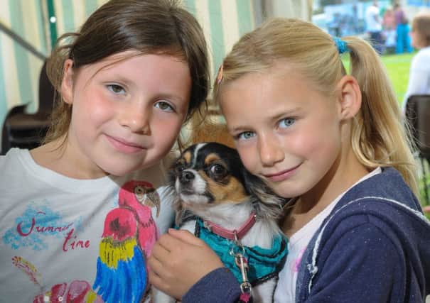 Niamh and Ella who brought along 'Poppy' to the Coagh Scrufts Dog Show and Family Fun Day.