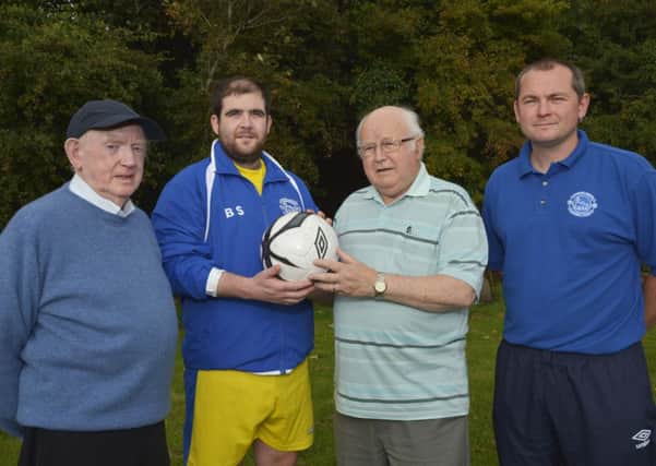 Jim Wallace, second from right, President of Brigade Cricket Club, pictured handing over a sponsored match ball for the Churchill United vs Newton Forest match in the 1st round of the Irish Junior Cup, to Churchill United player Packie Maguire. Included are Bert Simpson, club chairman, and Stewart Smallwoods, team manager. INLS3714-117KM