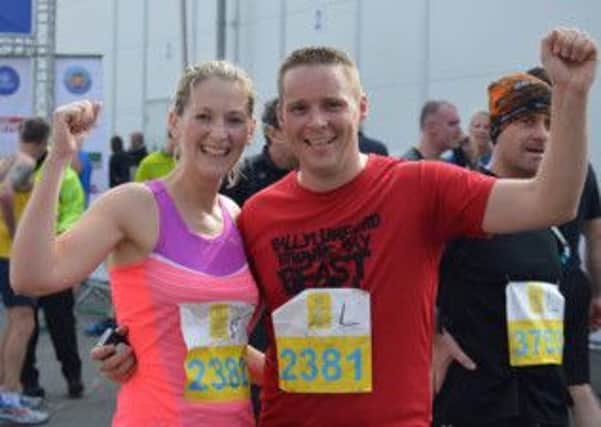 Wendy and Gary McKeegan pictured after the Belfast City Half Marathon race. INLT 38-906-CON