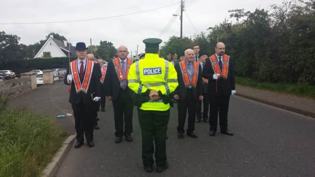 Police prevent members from walking to Dunloy Presbyterian church to conduct Divine worship. inbm38-14s