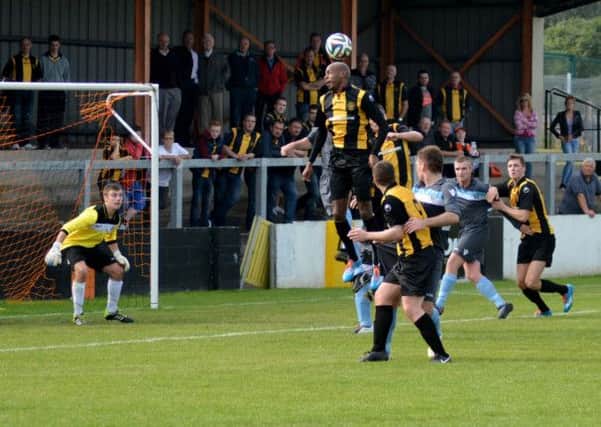 Miguel Chines, who scored a hat-trick against Lisburn Distillery on Saturday, rises above everyone to win this header. INCT 38-154-gr
