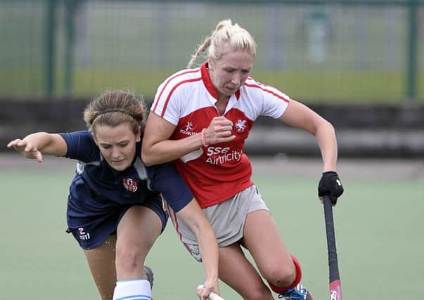 Andrea Desenaux of Ulster Elks tackles and Natalie Pinkerton of Pegasus. INLT 38-910-CON