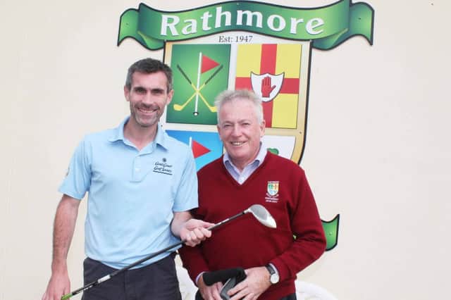 Keith Gillespie with Kenny McDowel President of Rathmore Golf Club.