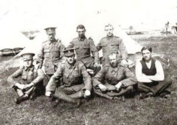 Can you identify the six soldiers in this picture alongside Alexander Lyttle (front row, second from left)?
