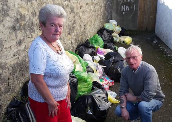 Catherine Gamble and Lloyd Magee are concerned fly-tippers could put children's health at risk in Bond's Street.
