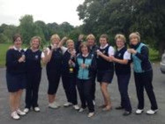 Andrea Watson, Leonie Power, Diane Patterson, Pauline McWilliams, Team Captain Sue McDonagh, Lady Captain Janet Douds, Jan Lindsay, Maureen Entwistle and Lorraine Toolan celebrating their Cowdy Cup win.