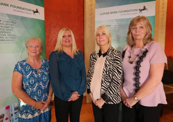 The Lloyds Bank Foundation for Northern Ireland has celebrated the work of organisations that are making a difference to the lives of disadvantaged people. Attending the event in Stormont are (left to right): Brenda Duff, Tiny Tots Preschool Playgroup; Vickie Shaw, Oxygen Therapy Centre, Magheramorne; Janine Donnelly, Trustee, Lloyds Bank Foundation for Northern Ireland and Linda Boyd, Oxygen Therapy Centre, Magheramorne.  INNT 38-676-CON