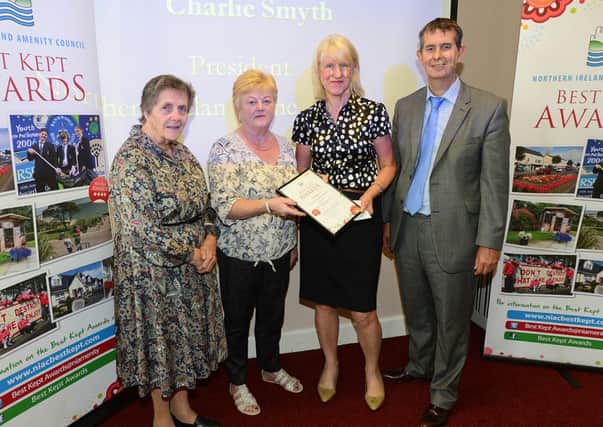 Mountvale Private Nursing Home in Dromore was awarded runner up in the Best Kept Residential Facility category in the Southern Trust area at the 2014 Best Kept Health and Social Care Facility Awards. 

Pictured (l-r): Doreen Muskett MBE, Chair of the Northern Ireland Amenity Council, Siobhan Rooney, Non Executive Director of the Southern Trust, Jean Dougan, Acting Nurse Manager at Mountvale Private Nursing Home and the Health Minister Edwin Poots.