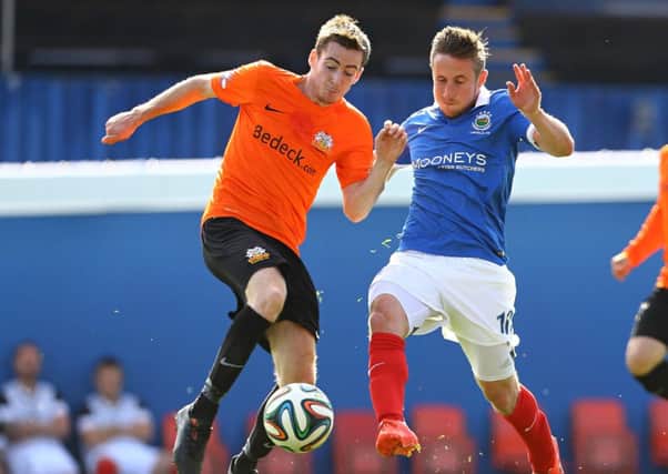 Glenavon's Andy McGrory on the attack.