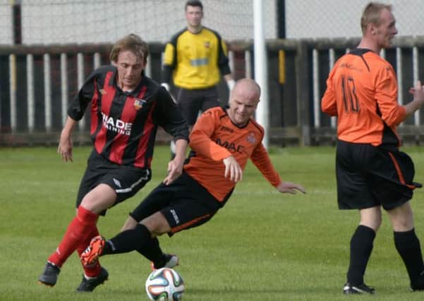 Banbidge Town followed up their Bob Radcliffe Cup exit to Tandragee with another defeat and another red card at Limavady. Edward Byrne Photography INBL1437-248EB