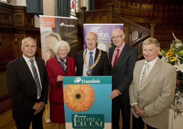 Celebrating success at the 2014 Translink Ulster in Bloom Competition are l-r Eric Morton and Cllr Joan Baird MBE, Banbridge District Council, Alderman Arnold Hatch, President, Northern Ireland Local Government Association, Philip ONeill, Chief Operating Officer, Translink and Billy Lyttle, Seapatrick Community Association. Scarva scooped the Small Village title and Seapatrick was third in the same category.