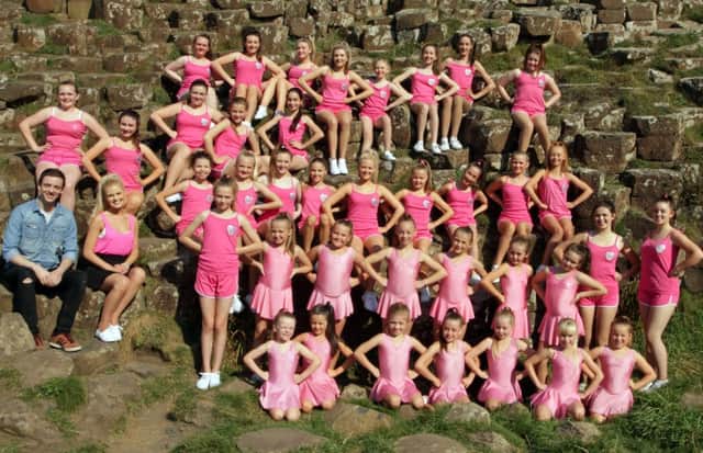 DRAMA AT THE STONES. Pictured are members of the Victoria Lagan Dancer's Drama Group launching the #lovetodance at the Giants Causeway on Sunday.INBM39-14 065SC.