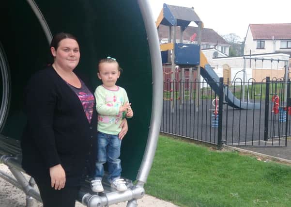Kirsty McMurray and her two-year-old daughter Bella McCalmont pictured at Millbrook playpark, where Bella discovered a sachet of the legal high Magic Dragon.  INLT 38-681-CON