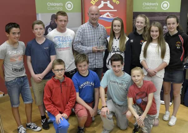Banbridge Amateur Swimming Club Coach Graham Knoxwho was awarded the Children's Coach of the Year Award  pictured with Club members. Edward Byrne Photography INBL1438-297EB