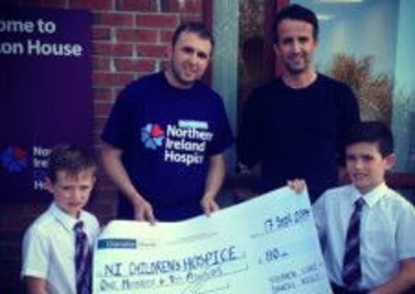 A Glengormley father and his two sons, who are all keen runners, raised some much needed funds for NI Hospice, last week, when they took part in the Laganside 10k and one mile races at Ormeau Park in Belfast. Stephen, Luke and Daniel Kelly, from Hollybrook Crescent, raised £110. 
Luke finished second in his age category (u-11) and Daniel was first in the under-sevens. Stephen finished the 10k in 45 minutes. The event was organised by North Belfast Harriers, the running club that the boys, who are pupils of St Bernard's Primary School, attend. INNT 39-457-CON