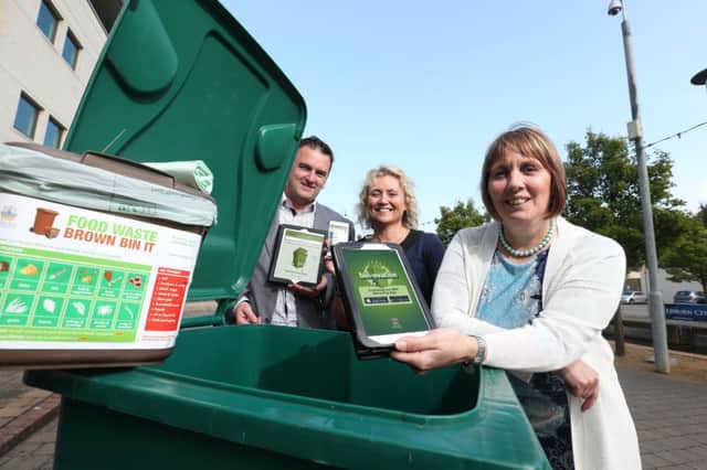 Councillor Jenny Palmer, Chair of the Council's Environmental Services Committee is pictured promoting the new Bin-Ovation App that the Council has signed up to alongside with Michael Brady, Bin-Ovation creator and Wendy Cooke from the DoE.