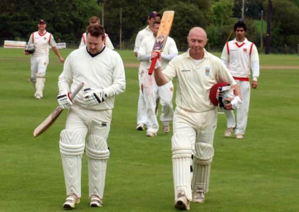 Decker Curry acknowledges the applause as he comes off after scoring a century for Ardmore against Brigade.