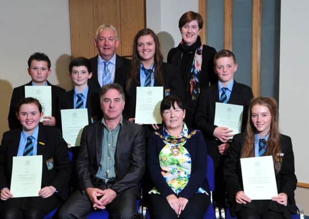 Students from St Colm's High School Draperstown who received certificates for attending the Gaeltacht over the Summer during the European Day of Languages celebrations held at Magherafelt Council Offices last Wednessday afternoon. Included in the are Magherafelt District Council Chairperson Kate McEldowney, Irish Language Officer  Déaglán " Doibhlin  Cllr Sean McPeake and Ann-Marie Campbell Director of Policy and Development at Magherafelt District Council.INMM4014-317