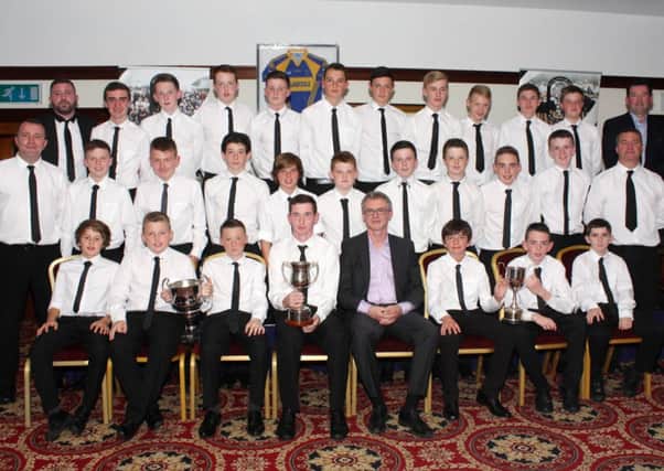 All Saints GAC Under 14 Gaelic Football Team who won the All Ireland Feile Title in June were presented with their medals in the Adair Arms Hotel at a recent function. Joe Brolly, former All Ireland winner with Derry and current RTE Gaelic football pundit, was guest of honour on the night and made the presentations.
