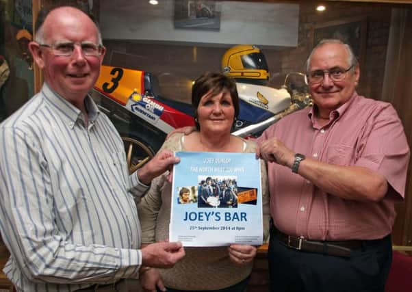 WIN ALOT. Pictured at the showing of Joey Dunlop's North West 200 wins at Joey's Bar on Thursday night along with Linda Dunlop are film maker, Colin James and former Honda UK Racing Manager, Barry Symmons.INBM40-14 046SC.