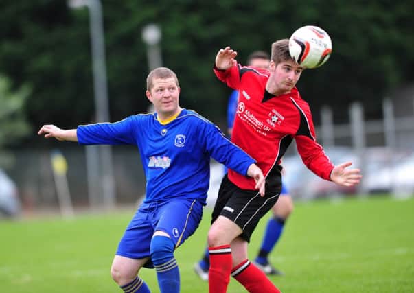 Desertmartin Swifts and Cookstown Olympic battle for the ball during Saturday's league encounter at Beechway.INMM4014-398