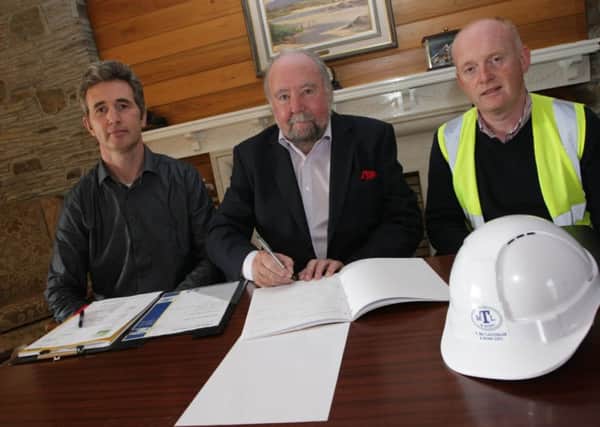 Michael McCafferty, Chairman, pictured on Thursday at the signing of the contract for the additional car park at the Foyle Hospice. Work started on the site on Monday last and will provide an additional 44 car parking spaces. Included are Nathan Armstrong, Project Architect, Hamilton Architects and Terence McLaughlin, J. McLaughlin & Sons, Contractors. DER3714MC036