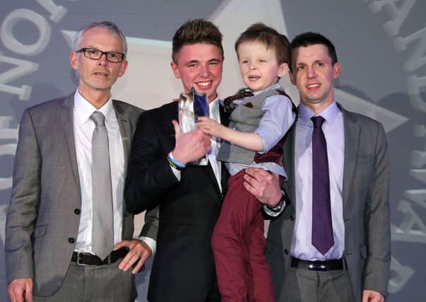 Britain's Got Talent Finalist, Jordan O'Keefe, with little Oscar Knox, when he won the overall award last year at the Spirit of Northern Ireland award,which was presented by Martin Bren and Tony McGinn. Photo: Press Eye/Kevin Boyne