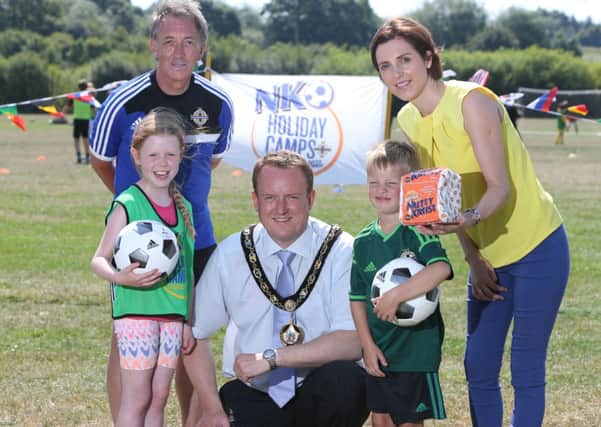 The Mayor of Craigavon Councillor Colin McCusker was a special guest at Kernan Playing Fields recently during the Irish Football Association-organised Nutty Krust Holiday Camp. Also included are, from left, Grace McNally, Ken Duncan (IFA grassroots development officer), Tom Irvine and Colette Wilson (Irwin's Bakery marketing manager).