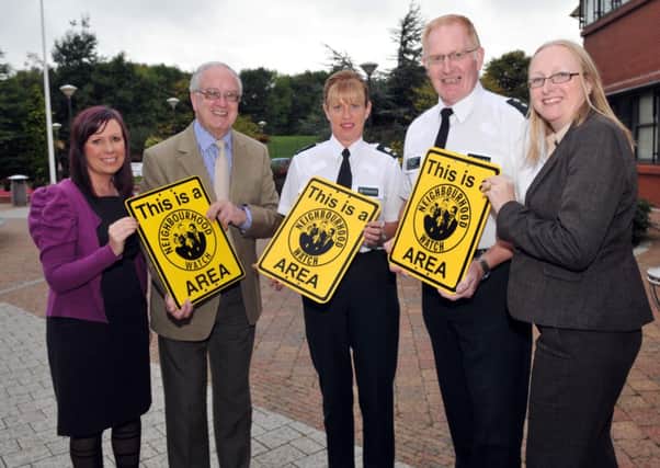 Ready for the Craigavon Policing and Community Safety Partnership, 8th Annual Neighbourhood Watch Event are, Lynette Cooke, PCSP project co-ordinator.Councillor Kenneth Twyble, chair of the PCSP,  Sergeant Wendy Walker, Chief Inspector Paul Reid and  Alison Clenaghan, PCSP manager.