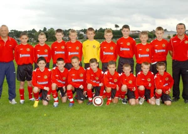 Manchester United defender Paddy McNair (fourth from left, front row, sitting behind ball) pictured with the Carniny Youth team which reached the Foyle Cup semi-final in 2007.