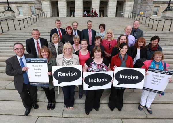 Mental Health Rights Campaign members from the Larne area pictured at Stormont with politicians who support the initiative. INLT 40-680-CON
