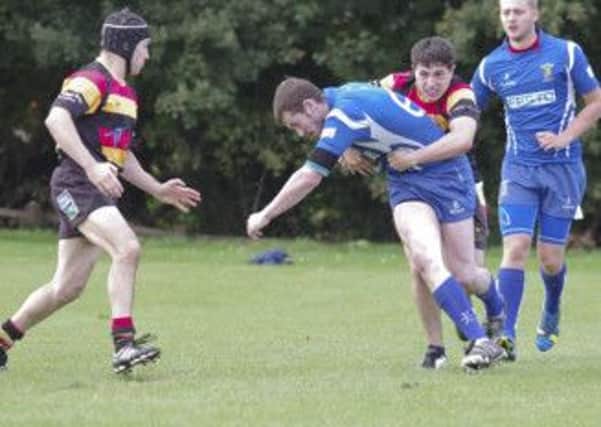 Action between Lurgan Seconds and Portadown Fourths.
