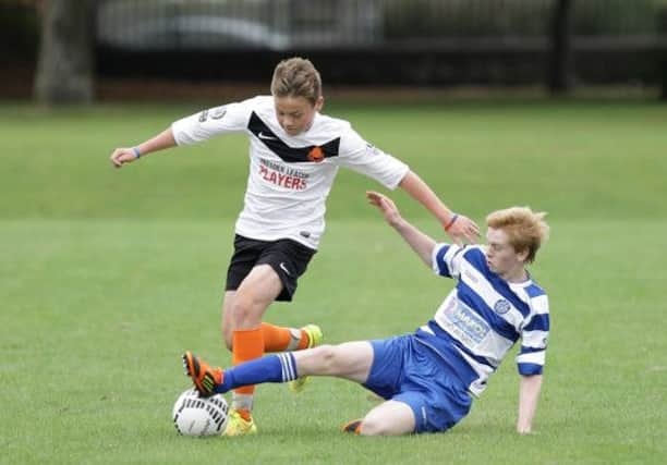 Youth soccer action from the under-15 game between Lisburn Youth and North End, at Wallace Park. US1440-511cd  Picture: Cliff Donaldson
