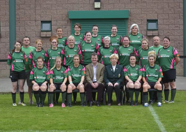 Victor Pollock, Sales Director, Donnelly & Taggart Ltd, one of the main team sponsors, pictured with the City of Derry Ladies team before their opening match of the season against Cooke at Judges Road on Sunday. Included are Susan Spence, President of City of Derry RFC, and Kelly Holmes, team captain. INLS3914-167KM