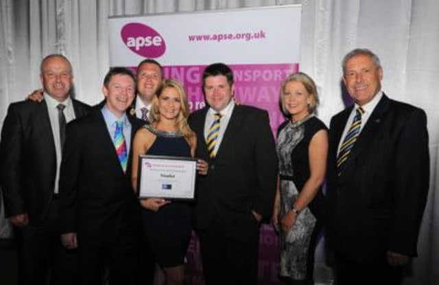 Pictured at the recent APSE Awards with the Council's Building Control Unit's Highly Commended Certificate presented by Maria Filippov of Dancing on Ice fame are: (l-r) Alderman James Tinsley, Vice-Chair of the Council's Planning Committee; Paul McAteer, Assistant Director of Environmental Services; the Mayor of Lisburn, Councillor Andrew Ewing; Michael Maguire, Business Development Manager; Kerrie-Anne McKibbin, Performance Development Officer and Councillor Uel Mackin, Chairman of the Council's Planning Committee.