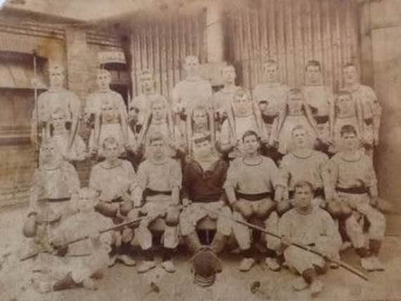 Carrick man Henry McMurran (second row from the back, third from the right) with comrades at a Royal Navy sports club.  INCT 40-706-CON