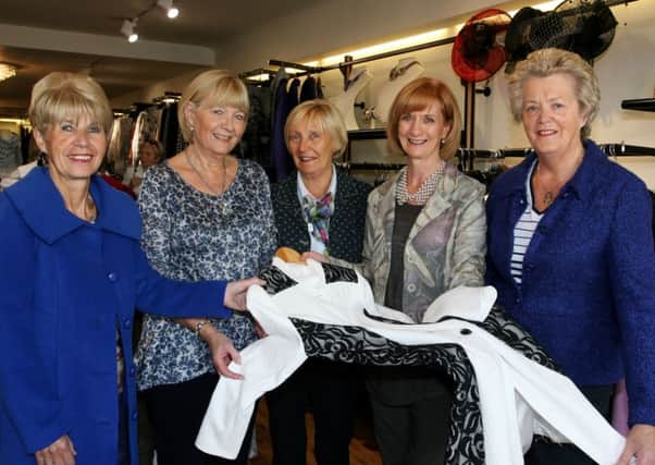 Lybis McAllister of Ultimate with NI Hospice members Maureen Baw, Toni Bailes, Rosemary Moore and Samina Bonar, promoting the NI Hospice Fashion Show in October 15. INBT40-225AC
