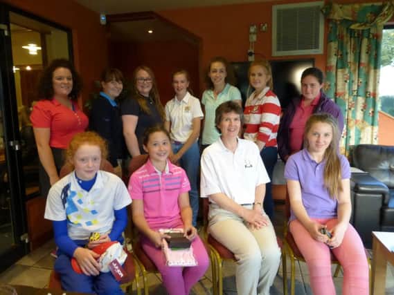 Prize winners and competitors with Jane Fleming (Girls Convenor Dunmurry GC).