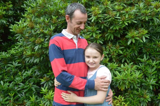 Peter Hutcheon with his daughter Amy.